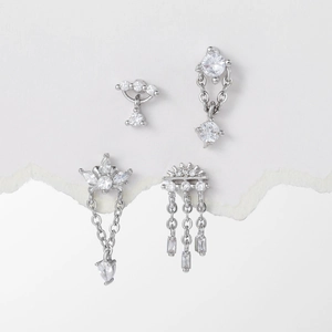 Set of four 18k gold plated silver stud earrings with zircon tassels and crown charms