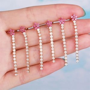 Pink daisy floral tassel earrings with white synthetic gems and stainless steel base
