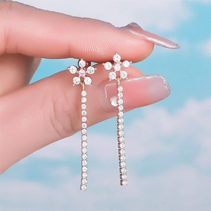 Daisy tassel earrings in stainless steel with white zircon pavé and pink center gemstone