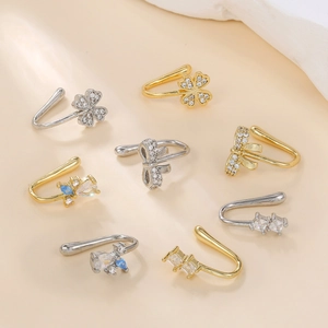 Ear cuff alla moda placcati oro 18k con fiocchi e farfalle e cristalli scintillanti