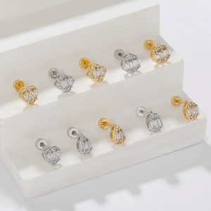Minimalist geometric floral stud earrings with tiny pavé crystals in gold and silver finish
