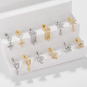 Sparkling tassel snowflake and heart stud earrings set in gold and silver finish