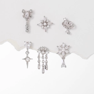 Silver snowflake and heart tassel ear studs set with shimmering zircon crystals