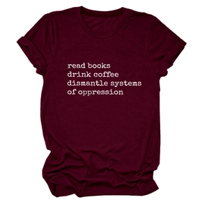 Detail of burgundy T-shirt with white slogan print about books, coffee, and systems