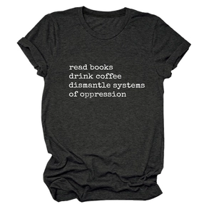 Flat lay of charcoal gray t-shirt with read books drink coffee text and rolled sleeves