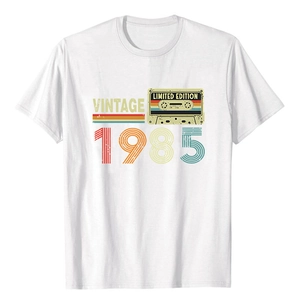 Detail of the 1985 vintage tape graphic on a white cotton crew neck t-shirt