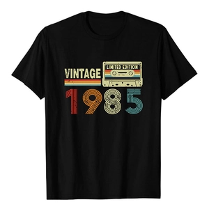Detailed view of Vintage 1985 graphic print on black cotton loose-fit men's t-shirt