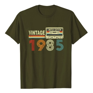 Vintage 1985 men's olive green crew neck t-shirt with retro cassette tape graphic print