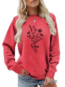 Détail du sweat-shirt brique motif floral Oma avec finitions bords-côtes et col rond