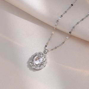 Elegant titanium steel necklace with oval zircon pendant and halo floral sparkle