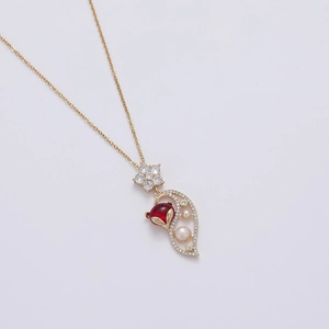 Elegant gold titanium necklace featuring freshwater pearl and red fox zircon pendant