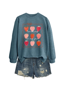 Detail of navy sweatshirt with strawberry graphics and Teaching is My Jam text print