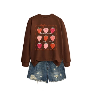 Brown long sleeve sweatshirt with strawberry 'teaching is my jam' print and denim shorts