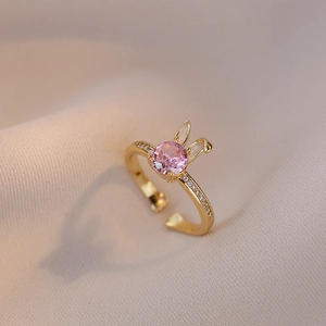 Adjustable gold ring with pink zircon rabbit ears and sparkling side stones