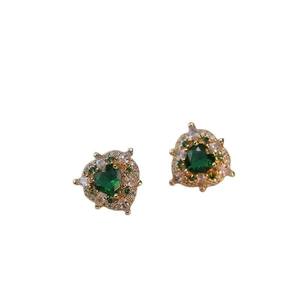 Elegant gold earrings with heart-shaped green zircon stones and micro-pave crystals