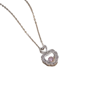 Pink heart-shaped zircon pendant necklace with layered design on silver chain