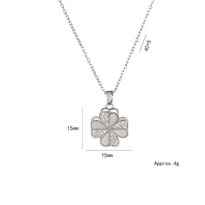 Rotating clover heart necklace in stainless steel with zircon inlay on white background
