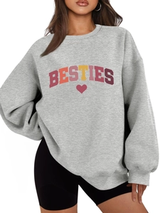 Close-up of Besties colorful gradient letter print and red heart on grey sweatshirt
