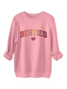 Detail of rolled sleeve and vintage BESTIES lettering on thick pink cotton sweatshirt