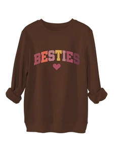 Detail of BESTIES letter print and heart graphic on coffee brown thick sweatshirt