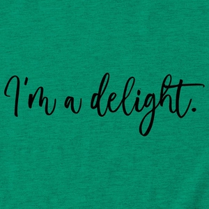 Detail shot of green cotton fabric showing knit texture and I'm a delight printed text