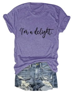 Detail of purple cotton T-shirt with I'm a delight print and distressed denim shorts