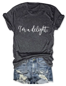 Detail of grey crewneck T-shirt with white 'I'm a delight' print and denim shorts