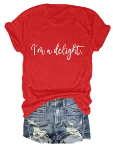 Flat lay of a red cotton T-shirt with I'm a delight print and distressed denim shorts
