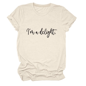 Detail of oatmeal beige t-shirt showing I'm a delight printed script and cotton texture