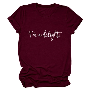 Detail of burgundy crew neck t-shirt featuring I'm a delight white script print