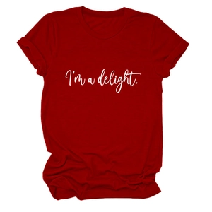 Detail view of red cotton T-shirt featuring white I'm a delight slogan print on chest