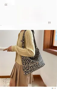 Chic leopard print canvas tote bag styled with casual autumn outfit for a trendy look