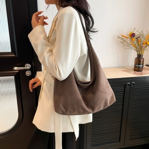 Vintage brown matte suede hobo shoulder bag with a spacious minimalist moon shape design