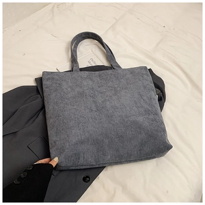Borsa tote minimalista grande in velluto a coste blu navy con texture a righe verticali