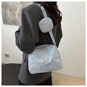 Light blue pleated shoulder bag with butterfly metal buckle and mini round pouch set