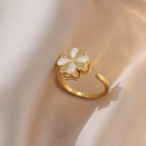 Adjustable open ring with spinning enamel flower and sparkling zircons on satin