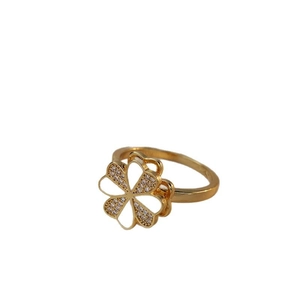 Golden flower open ring featuring white enamel petals and shimmering zircon crystals