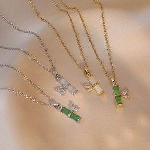 Collier Pendentif Noeud De Bambou Vintage Acier Titane Avec Feuille De Zircon Et Pierre Oeil De Chat Synthétique Pour Femme