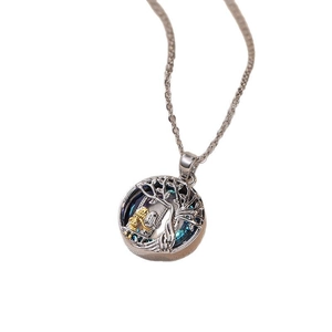 Silver tree of life necklace with blue crystal and golden figures pendant