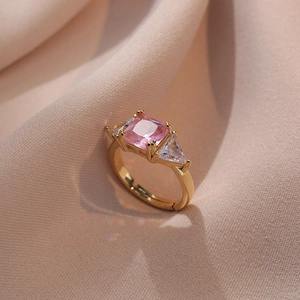 Elegant gold open ring featuring square pink zircon and triangular side stones