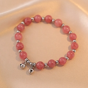 Natural pink crystal beaded bracelet with silver spacers and double bell charms on silk