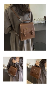 Detail of vintage brown backpack with cute puppy patch and adjustable buckles