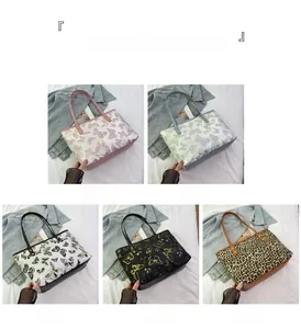 Detail showing five floral and butterfly pattern tote bags in various color combinations