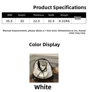Detailed size specifications of the cream canvas tote bag with black leather straps