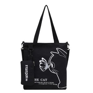 Large black canvas tote bag with cat and butterfly illustration and matching coin purse