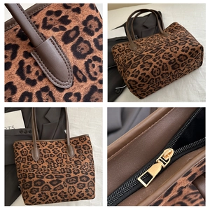 Dettagli della borsa tote leopardata in ecopelliccia con cerniera dorata pregiata
