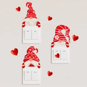 Lichtgevende kerstgnome muurstickers met rode harten voor decoratie van schakelaar