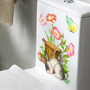 Detail of watercolor gray rabbit and floral wall sticker on a white toilet tank