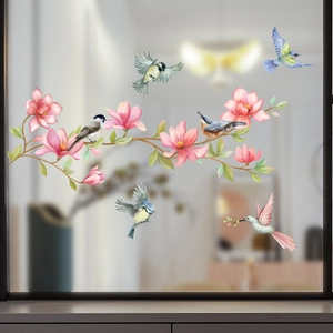 Static cling window film with watercolor pink magnolia flowers and colorful birds