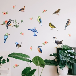 Detailed realistic watercolor bird and pink flower wall stickers in a modern home interior